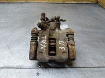 Суппорт задний правый 4T446U Nissan Almera