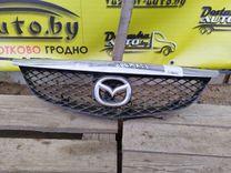 Решетка радиатора K01G7X Mazda Premacy