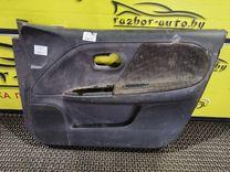 Обшивка двери передней правой (дверная карта) Z158B3 Nissan Note