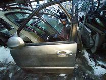 Замок двери передней левой F94A73 Kia Carnival - Фото 1