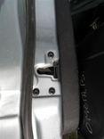 Замок двери передней левой 303B15 Ford Fusion