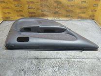 Обшивка двери задней левой (дверная карта) 13W7FK Toyota Corolla купить с доставкой