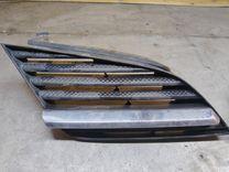 Решетка радиатора T879HP Nissan Primera купить