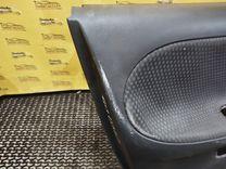 Обшивка двери передней левой (дверная карта) UO8WTJ Nissan Note купить с доставкой