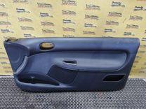 Обшивка двери передней правой (дверная карта) EFA43P Peugeot 206