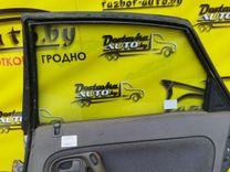 Стекло двери задней правой 40L2VK Mazda 626 купить в магазине запчастей бу