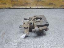 Суппорт задний левый 011B00 Opel Vectra