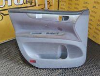 Обшивка двери передней левой (дверная карта) EA52MT Toyota Avensis Verso