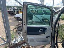 Обшивка двери задней левой (дверная карта) 86KNI0 Skoda Roomster