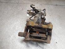 Суппорт задний правый 9CI0UK Volkswagen Caddy купить в магазине запчастей бу