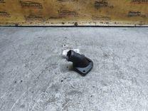 Фланец (тройник) системы охлаждения AV0Z6O Audi A4