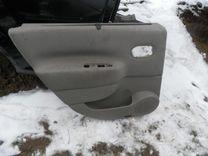 Обшивка двери задней левой (дверная карта) 6K292M Renault Scenic