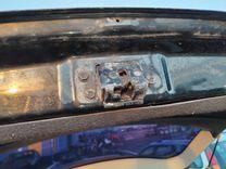 Замок багажника L2RQ38 Toyota Avensis