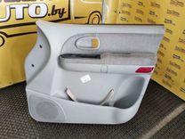 Обшивка двери передней правой (дверная карта) EL036T Hyundai Trajet