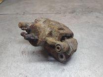 Суппорт передний левый B9ACRA Mazda Premacy купить в магазине запчастей бу