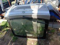 Стекло заднее 040BDA Opel Astra