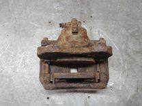 Суппорт передний левый 29NBKF Nissan Primera купить в магазине запчастей бу