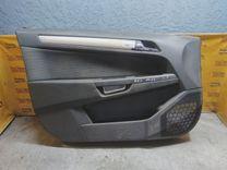 Обшивка двери передней левой (дверная карта) 09G90U Opel Astra купить