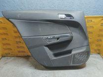 Обшивка двери задней левой (дверная карта) CX5UEL Opel Astra купить