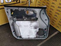 Обшивка двери передней правой (дверная карта) EL036T Hyundai Trajet купить