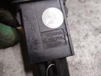 Кнопка открытия лючка топливного бака TGLPYY Toyota Avensis купить в магазине запчастей бу