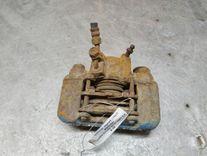 Суппорт задний левый 9QM0QW Toyota Corolla Verso