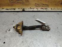 Ограничитель открывания двери передней C6LCE1 Nissan Primera - Фото 1