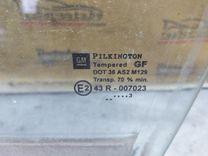 Стекло двери передней левой M2MF27 Opel Zafira купить в магазине запчастей бу