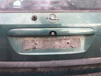 Накладка подсветки номера XMEF4Q Opel Zafira - Фото 2