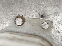 Кронштейн усилителя бампера заднего (домик) ZF04GO Nissan Note купить в магазине запчастей бу