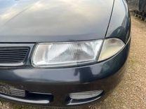 Поворотник левый AUNTE2 Mitsubishi Carisma купить