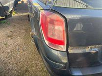 Фонарь задний левый X0LNQ5 Opel Astra