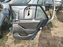 Обшивка двери задней правой (дверная карта) WH07U0 Toyota Avensis