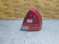 Фонарь задний правый XA9AJS Mitsubishi Carisma купить с доставкой