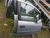 Стекло двери передней правой 8129YG Opel Zafira