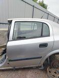 Дверь задняя левая 0RO7RG Opel Astra