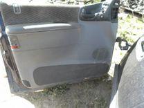 Обшивка двери передней левой (дверная карта) QYV73Y Chrysler Voyager - Фото 1