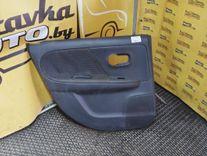 Обшивка двери задней левой (дверная карта) NI18EW Nissan Note