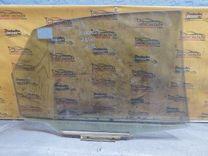 Стекло двери задней левой DFK1WX Toyota Corolla купить в магазине запчастей бу