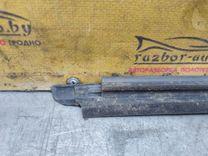 Молдинг стекла двери задней левой наружный R1DT8E Toyota Yaris Verso купить в магазине запчастей бу