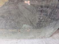 Стекло двери передней левой EOL4Q5 Mazda Premacy купить в магазине запчастей бу