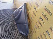 Обшивка двери задней левой (дверная карта) AXWC26 Toyota Corolla купить в магазине запчастей бу