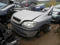 Ус под фару левый SFHN4S Opel Zafira