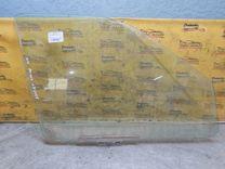 Стекло двери передней левой OKUK1T Ford Escort