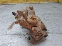 Суппорт задний левый TFJ6CG Toyota Corolla купить в магазине запчастей бу