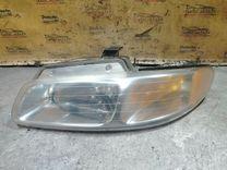 Фара левая I843EE Chrysler Voyager - Фото 1