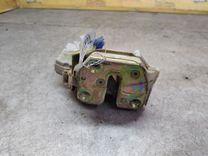 Замок двери задней левой K7O6YZ Nissan Primera - Фото 1