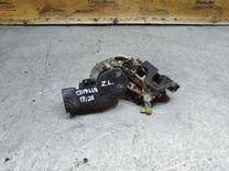 Замок двери задней левой UB1CX5 Toyota Corolla купить с доставкой