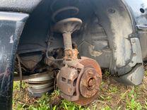 Кулак поворотный левый 0YG0F3 Mazda 626